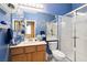 Bathroom boasting decorative accents and modern fixtures and a glass enclosed shower stall at 7404 Dry Corral Ln, Las Vegas, NV 89113