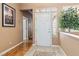 Welcoming foyer with tile and wood floors at 7404 Dry Corral Ln, Las Vegas, NV 89113