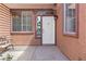 Inviting front porch featuring a bench with seating at 7404 Dry Corral Ln, Las Vegas, NV 89113