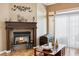 Cozy living room featuring a fireplace at 7404 Dry Corral Ln, Las Vegas, NV 89113