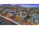 Stunning aerial view of the home with solar panels, surrounded by lush landscaping and mountain views at 754 Spirit Lake St, Las Vegas, NV 89138