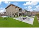 Expansive backyard view with modern furniture, a fire pit, and luxurious amenities for outdoor living at 754 Spirit Lake St, Las Vegas, NV 89138