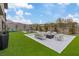 Enjoy the backyard with a modern fireplace, hot tub, and ample seating perfect for outdoor entertaining at 754 Spirit Lake St, Las Vegas, NV 89138