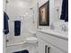 Modern bathroom features a glass shower enclosure, white marble tile, and sleek fixtures at 754 Spirit Lake St, Las Vegas, NV 89138