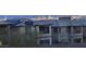Modern home exterior with solar panels and a stunning view of the city skyline at 754 Spirit Lake St, Las Vegas, NV 89138