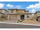 Charming two-story home featuring a well-manicured lawn and a spacious two-car garage at 754 Spirit Lake St, Las Vegas, NV 89138