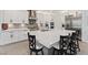 Spacious kitchen featuring an island, stainless appliances, ample counter space, and elegant cabinetry at 754 Spirit Lake St, Las Vegas, NV 89138