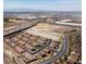 Aerial view showcasing a new sports complex, nearby freeways and a townhome community at 756 Sleeping City Ave, Henderson, NV 89015