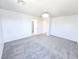 Spacious carpeted bedroom featuring a modern ceiling fan and ample natural light at 756 Sleeping City Ave, Henderson, NV 89015
