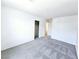 Carpeted bedroom with sliding closet doors and neutral walls at 756 Sleeping City Ave, Henderson, NV 89015
