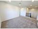 A spacious bonus room with neutral carpet and ample natural light from recessed lighting at 756 Sleeping City Ave, Henderson, NV 89015