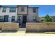 Charming townhome featuring modern architecture, a gated front yard, and a well-maintained exterior at 756 Sleeping City Ave, Henderson, NV 89015