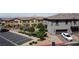View of townhomes within a community featuring common green spaces and playground at 756 Sleeping City Ave, Henderson, NV 89015