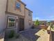 Inviting two-story home with a landscaped front yard and charming curb appeal at 756 Sleeping City Ave, Henderson, NV 89015