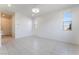 Bright, open-concept living room with tile flooring, recessed lighting, and large windows at 756 Sleeping City Ave, Henderson, NV 89015