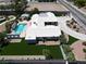 A birds-eye view reveals the meticulous landscaping and a sparkling blue swimming pool at 7575 Coley Ave, Las Vegas, NV 89117