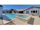 Beautiful backyard pool and spa with ample patio space, ideal for enjoying sunny days and entertaining guests at 7575 Coley Ave, Las Vegas, NV 89117