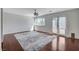 Cozy bedroom with hardwood floors, ceiling fan, and natural light, creating a relaxing and inviting space at 7575 Coley Ave, Las Vegas, NV 89117