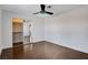 Spacious bedroom featuring hardwood floors and modern ceiling fan, creating a comfortable living space at 7575 Coley Ave, Las Vegas, NV 89117