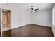 Spacious bedroom featuring hardwood floors, ceiling fan, and bright natural light at 7575 Coley Ave, Las Vegas, NV 89117