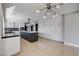 Modern kitchen with stainless steel appliances, stylish island, and abundant storage for the home chef at 7575 Coley Ave, Las Vegas, NV 89117