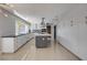 Bright, modern kitchen with spacious island, stainless appliances, and ample counter space for cooking at 7575 Coley Ave, Las Vegas, NV 89117