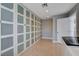 Laundry room featuring custom cabinets and storage with an adjacent countertop at 7575 Coley Ave, Las Vegas, NV 89117