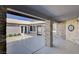 Charming patio featuring stone pillars and a tile roof, offering a stylish and welcoming outdoor living area at 7575 Coley Ave, Las Vegas, NV 89117