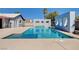 Backyard swimming pool and art wall offering a refreshing outdoor experience at 7575 Coley Ave, Las Vegas, NV 89117