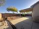 Spacious backyard with patio area, desert landscaping and mature trees at 7611 Avila Beach Ave, Las Vegas, NV 89113