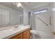 Bathroom with a shower-tub, vanity and large mirror at 7898 Rye Canyon Dr, Las Vegas, NV 89123