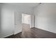 Neutral bedroom with hardwood floors, dual entryways and a ceiling fan at 7898 Rye Canyon Dr, Las Vegas, NV 89123