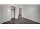 Bedroom featuring hardwood floors and a closet with white doors at 7898 Rye Canyon Dr, Las Vegas, NV 89123