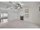 Cozy living room with tile floors, fireplace, and built-in shelves for décor at 7898 Rye Canyon Dr, Las Vegas, NV 89123