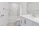 Bathroom featuring a shower-tub combo, a sink with white countertop, and modern fixtures at 8125 Monsoon Bay St, Las Vegas, NV 89113