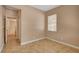 Bright bedroom with natural light from the window, offering a simple and functional space at 8988 Winchester Ridge St, Las Vegas, NV 89139