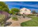 Serene community park featuring desert landscaping, trees and walking path at 8988 Winchester Ridge St, Las Vegas, NV 89139