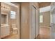 Hallway with a view of a bathroom, features a closet and leads into a bedroom at 8988 Winchester Ridge St, Las Vegas, NV 89139