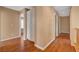 Hallway featuring wood floors and ample built in storage at 8988 Winchester Ridge St, Las Vegas, NV 89139