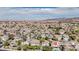 Wide aerial view of the neighborhood with mountain views and the property's location marked at 901 Sir Winston St, Henderson, NV 89052