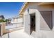 Private balcony with stucco walls, offering a relaxing outdoor space at 901 Sir Winston St, Henderson, NV 89052