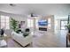 Bright living room with neutral colors, fireplace, and modern decor at 901 Sir Winston St, Henderson, NV 89052