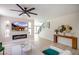 Stylish living room with fireplace, modern decor and access to the second floor at 901 Sir Winston St, Henderson, NV 89052