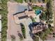 Aerial view of a home showcasing a pool, landscaping, and ample parking at 912 Santa Ynez Ave, Henderson, NV 89002