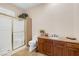 Well-lit bathroom with shower, commode, and vanity featuring granite countertops and wood cabinets at 912 Santa Ynez Ave, Henderson, NV 89002