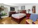 Comfortable bedroom showcasing classic wood furniture and bright, natural light at 912 Santa Ynez Ave, Henderson, NV 89002