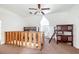 Bright bedroom featuring a ceiling fan and multiple bunk beds, perfect for accommodating a large Gathering at 912 Santa Ynez Ave, Henderson, NV 89002