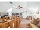 Spacious room with bunk beds, complemented by a ceiling fan, cozy seating, and charming decor at 912 Santa Ynez Ave, Henderson, NV 89002