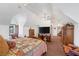 Spacious bedroom with a large television and carpeted flooring at 912 Santa Ynez Ave, Henderson, NV 89002