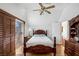 Bedroom with shuttered windows and wood floors at 912 Santa Ynez Ave, Henderson, NV 89002
